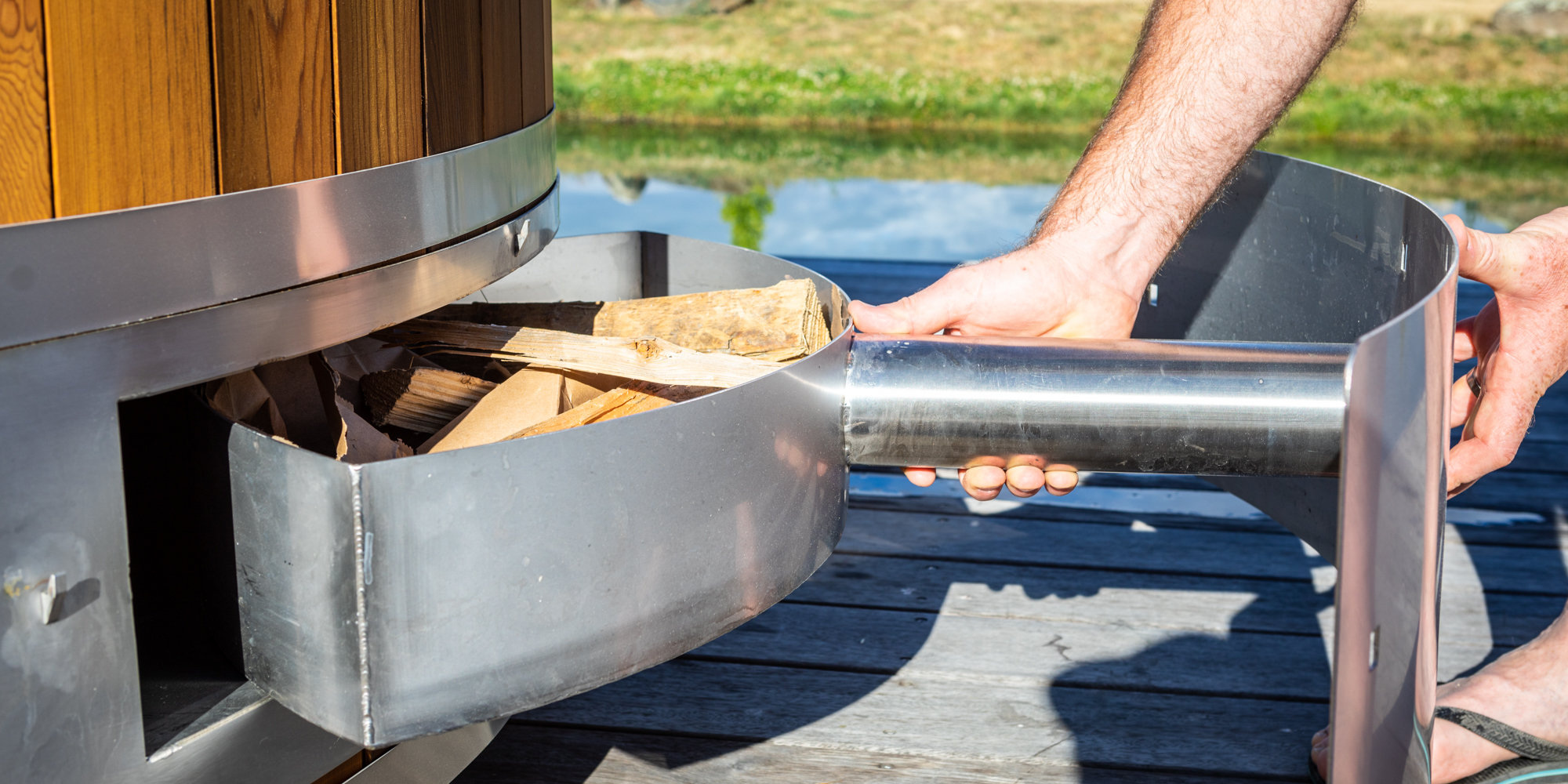 Rocket stove style fuel combustion design